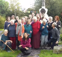 Sangha in front of stupa